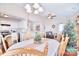 Dining area with hardwood floors and seamless access to the kitchen and living room at 3076 Champion Sw Ln, Concord, NC 28025