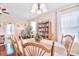 Comfortable dining area featuring hardwood floors, pendant lighting, and connection to the living area at 3076 Champion Sw Ln, Concord, NC 28025