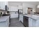 Contemporary kitchen with white cabinets, stainless steel appliances, and a granite island at 3611 Whitney Way, Terrell, NC 28682