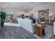 Bright living room flows into a modern kitchen with stainless steel appliances and adjacent dining area at 3611 Whitney Way, Terrell, NC 28682