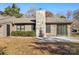 Private patio and stone chimney in backyard at 375 Sweetgum Dr, Fort Mill, SC 29715