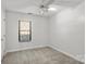 Well-lit bedroom with ceiling fan and window at 375 Sweetgum Dr, Fort Mill, SC 29715