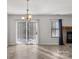 Spacious dining area featuring a fireplace and sliding doors to patio at 375 Sweetgum Dr, Fort Mill, SC 29715