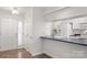 Bright entryway with tile flooring and kitchen view at 375 Sweetgum Dr, Fort Mill, SC 29715