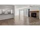 Living room featuring a stone fireplace and tile floors at 375 Sweetgum Dr, Fort Mill, SC 29715