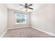 Cozy bedroom featuring a ceiling fan and a window that offers great natural light at 11005 Magna Ln, Indian Trail, NC 28079