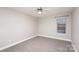 Bedroom featuring neutral paint, carpet, and natural light from a window at 11005 Magna Ln, Indian Trail, NC 28079