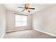 Cozy bedroom featuring a ceiling fan and a window that offers great natural light at 11005 Magna Ln, Indian Trail, NC 28079