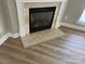 Close-up of the fireplace with marble surround and hearth at 11005 Magna Ln, Indian Trail, NC 28079