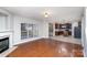 Living room flows into a kitchen with an island at 11005 Magna Ln, Indian Trail, NC 28079