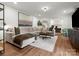 Comfortable living room with hardwood floors, neutral colors, and stylish decor at 1102 Oak Hill Dr, Monroe, NC 28112