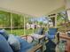 Relaxing sunroom with comfortable seating and a scenic view of the backyard at 1102 Oak Hill Dr, Monroe, NC 28112