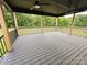 Expansive deck with wood railings, offering ample space for outdoor seating and entertaining at 1215 Coppergate Dr, Salisbury, NC 28147