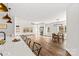 Open floor plan features hardwood floors, a fireplace, and seamlessly connects the living, dining, and kitchen at 1215 Coppergate Dr, Salisbury, NC 28147