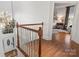 Bright Foyer with hardwood floors, chandelier, staircase and door leading to a bedroom at 13101 Whisper Creek Dr, Charlotte, NC 28277