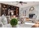 Comfortable living room with built-in shelving, fireplace, and neutral decor at 13101 Whisper Creek Dr, Charlotte, NC 28277