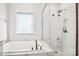 Modern bathroom with marble finishes and a spacious shower at 2522 Lola Ave, Charlotte, NC 28205