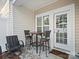 Cozy patio with bistro table and chairs at 4641 Craigmoss Ln, Charlotte, NC 28278