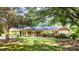 Charming brick home featuring a well-maintained lawn, inviting curb appeal, and a classic architectural design at 829 Rawlinson Rd, Rock Hill, SC 29732