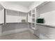 Walk-in closet with custom shelving and ample storage space at 1015 Kendall Dr # 4, Wesley Chapel, NC 28173