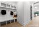 Hall tree mudroom with storage cubbies and bench, perfect for organization at 1015 Kendall Dr # 4, Wesley Chapel, NC 28173