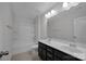 Bathroom with double vanity and shower/tub combo at 10436 Paisley Abbey Ln, Charlotte, NC 28273