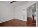 Bright bedroom with hardwood floors and double french doors at 10436 Paisley Abbey Ln, Charlotte, NC 28273