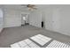 Large bedroom with gray carpet and built-in shelving at 10436 Paisley Abbey Ln, Charlotte, NC 28273