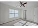 Bedroom with ceiling fan and neutral decor at 10436 Paisley Abbey Ln, Charlotte, NC 28273