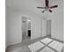 Bedroom with ceiling fan and access to bathroom at 10436 Paisley Abbey Ln, Charlotte, NC 28273