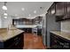 Spacious kitchen with stainless steel appliances and granite countertops at 10436 Paisley Abbey Ln, Charlotte, NC 28273