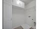 Laundry room with washer/dryer hookups and storage cabinets at 10436 Paisley Abbey Ln, Charlotte, NC 28273