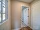 Bright entryway with view into an interior hallway at 131 Nantz Ave, Mount Holly, NC 28120