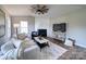 Cozy living room with fireplace and built-in shelving at 131 Nantz Ave, Mount Holly, NC 28120