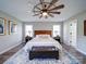 Main bedroom with hardwood floors and ceiling fan at 131 Nantz Ave, Mount Holly, NC 28120