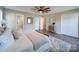 Main bedroom with hardwood floors and ceiling fan at 131 Nantz Ave, Mount Holly, NC 28120