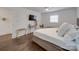 Bedroom with wood floors, a TV and ceiling fan at 1330 Mulberry Ave, Charlotte, NC 28216