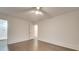 Bright bedroom with hardwood floors and access to bathroom at 1330 Mulberry Ave, Charlotte, NC 28216