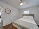 Charming bedroom with wood floors, ceiling fan and mirror at 1330 Mulberry Ave, Charlotte, NC 28216