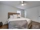 Well lit bedroom with wood floors and ceiling fan at 1330 Mulberry Ave, Charlotte, NC 28216