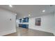 Modern kitchen with blue cabinets and stainless steel appliances at 1330 Mulberry Ave, Charlotte, NC 28216