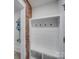 Laundry room with built-in storage and hooks at 1330 Mulberry Ave, Charlotte, NC 28216