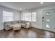 Living area showcasing hardwood floors and a gray sectional sofa at 1330 Mulberry Ave, Charlotte, NC 28216