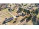 Aerial view showing a house with a large backyard and surrounding neighborhood at 135 Rumple Hill Dr, Statesville, NC 28677