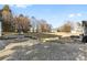 Large backyard with gravel patio and firepit at 135 Rumple Hill Dr, Statesville, NC 28677