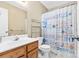 Charming bathroom with beach-themed shower curtain at 135 Rumple Hill Dr, Statesville, NC 28677