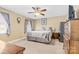 Spacious bedroom with ceiling fan and ample closet space at 135 Rumple Hill Dr, Statesville, NC 28677