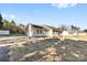 House exterior with a detached garage and landscaping at 135 Rumple Hill Dr, Statesville, NC 28677