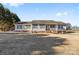 Ranch house with green shutters and a covered porch at 135 Rumple Hill Dr, Statesville, NC 28677