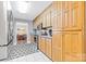 Kitchen boasts stainless steel appliances and ample cabinet space at 135 Rumple Hill Dr, Statesville, NC 28677